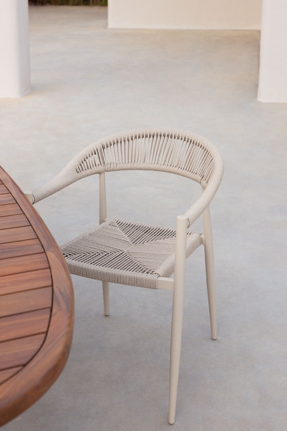 Stackable garden chair with armrests in aluminium and synthetic rattan Amatria, gallery image 1