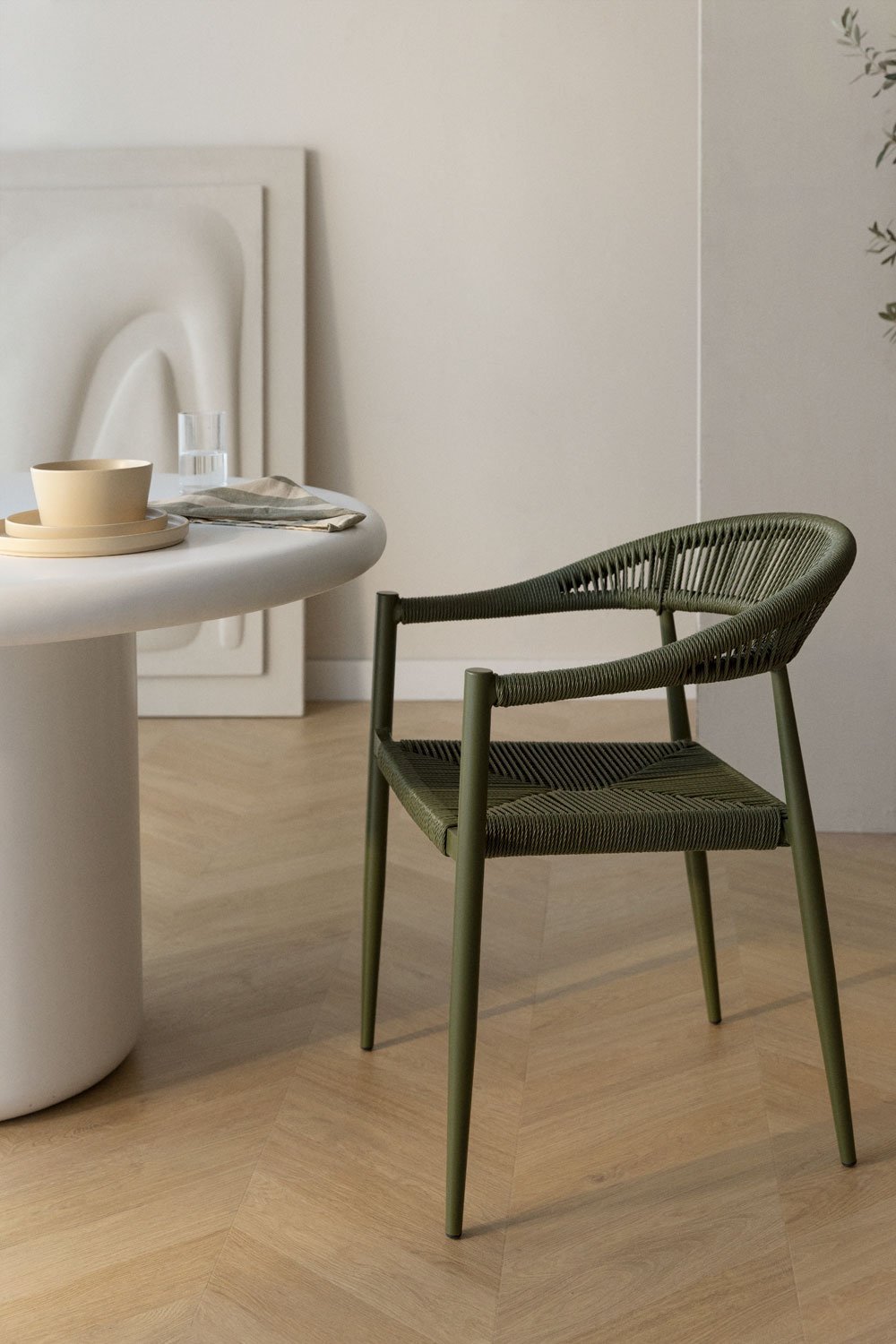 Stackable dining chair with armrests in aluminium and synthetic rattan Amatria, gallery image 1