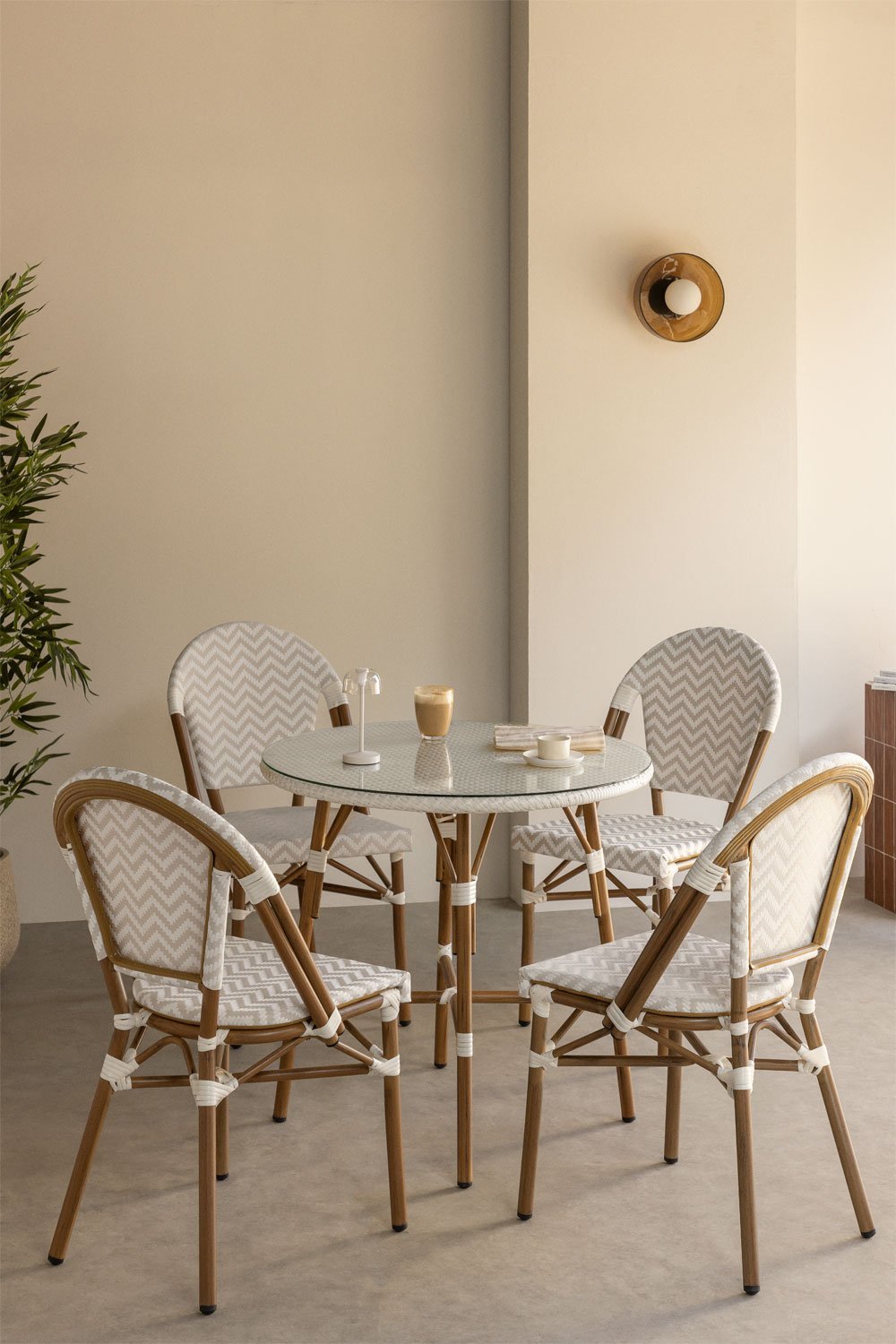 Round table set Ø80 cm and 4 stackable dining chairs in aluminum and synthetic rattan Brielle Bistro, gallery image 1