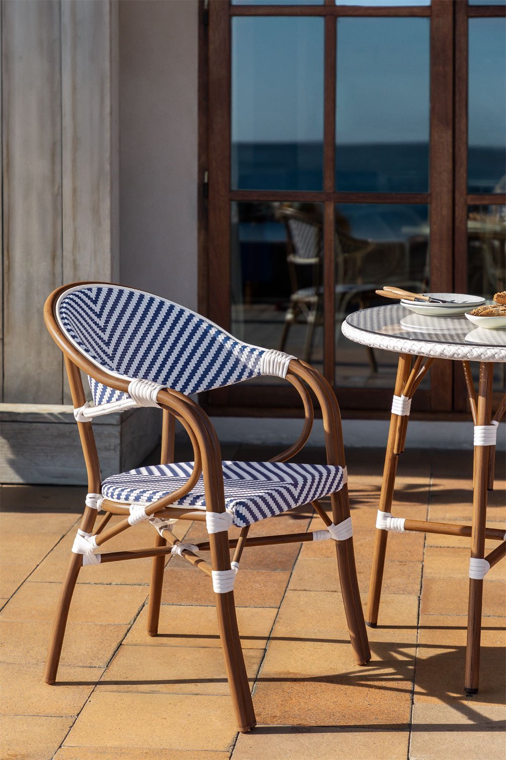 Pack of 4 Brielle Bistro aluminium stackable garden chairs with armrests, gallery image 1