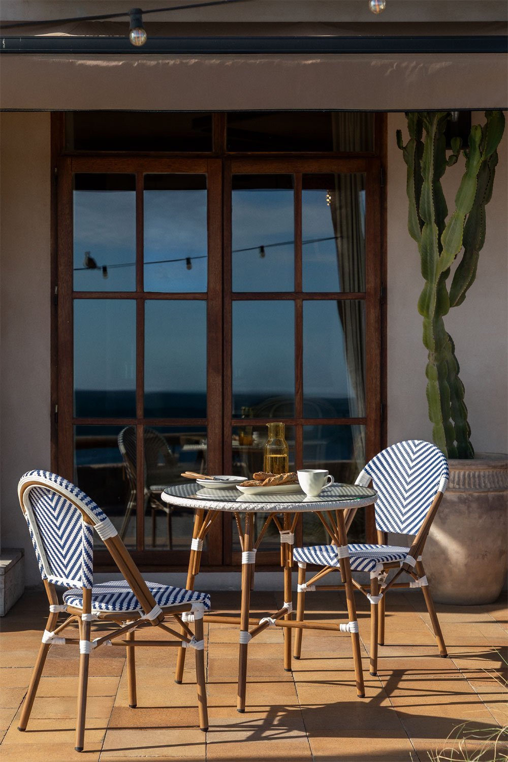 Brielle Bistro round table set (80 cm diameter) and two stackable aluminum garden chairs, gallery image 1