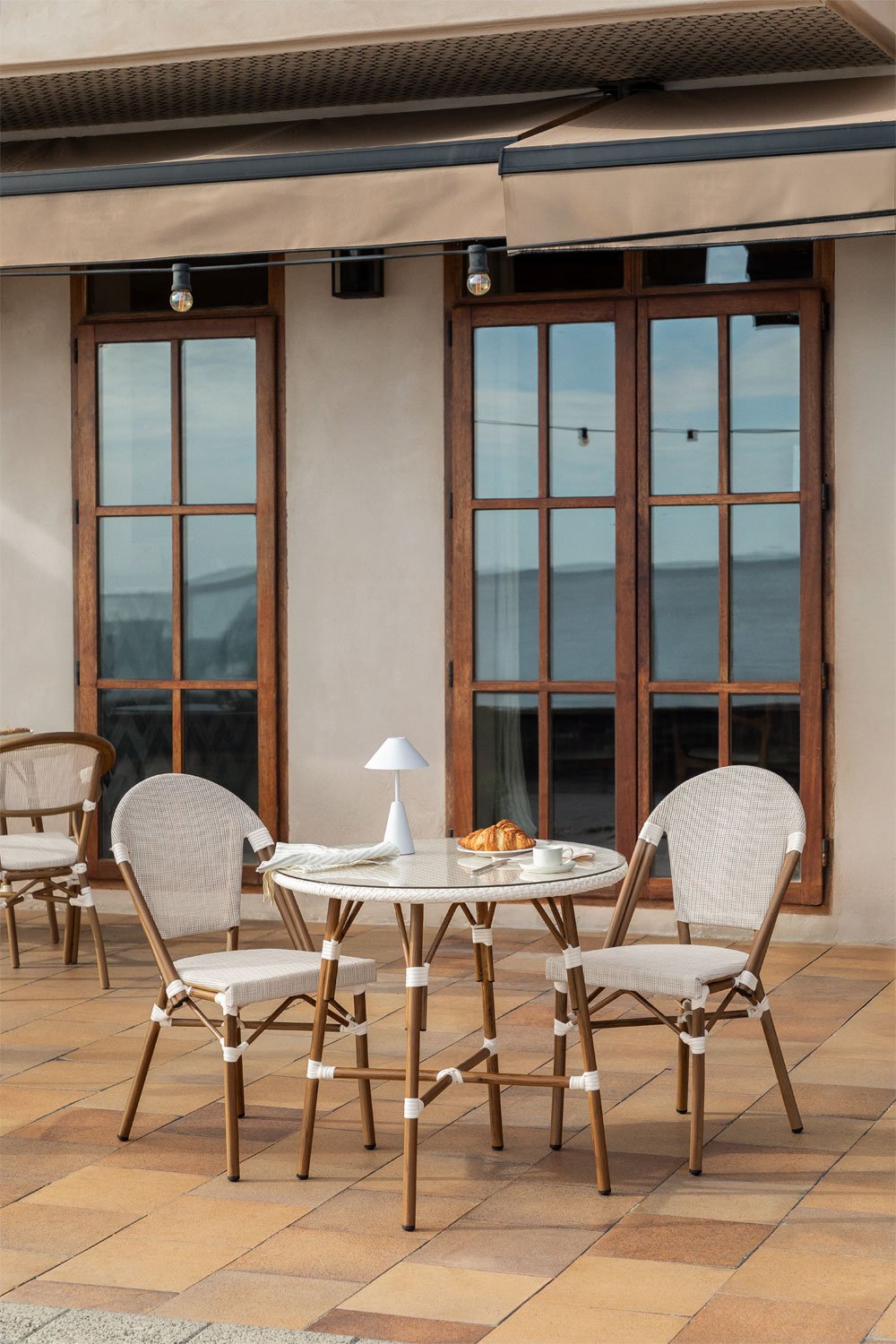 Brielle Bistro round table set (80 cm diameter) and two stackable aluminum garden chairs, gallery image 1