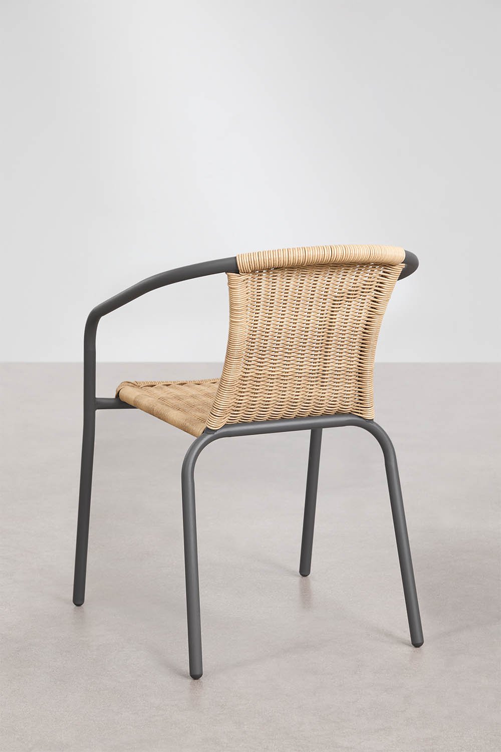 Stackable dining chair with steel armrests and synthetic wicker Kalymana, gallery image 3