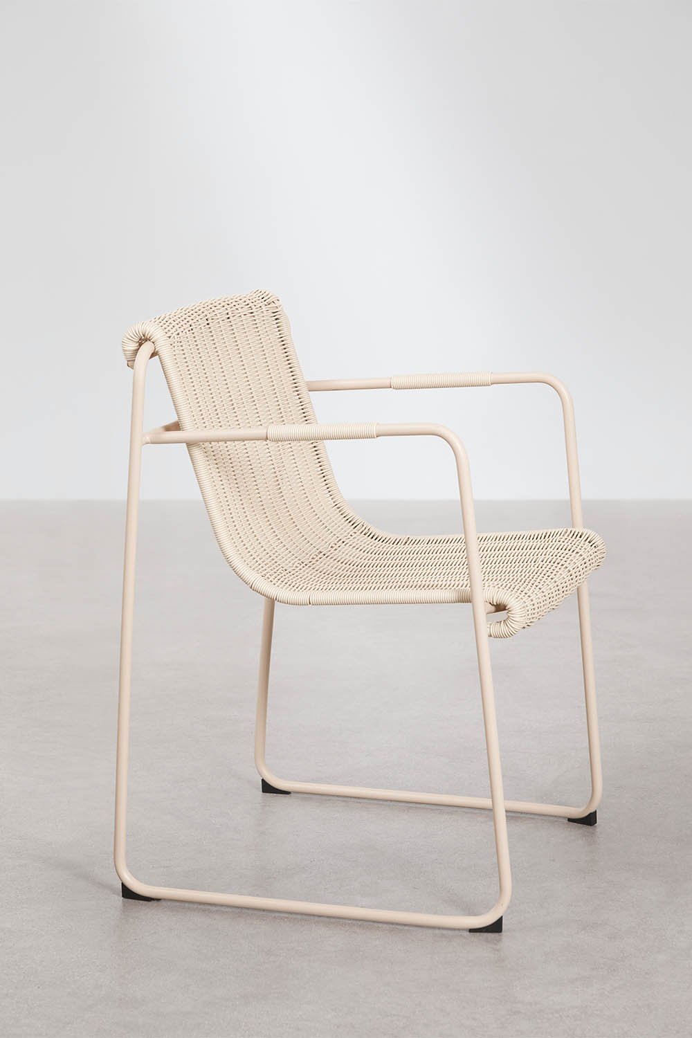 Stackable dining chair with armrests in synthetic wicker and steel Revia, gallery image 2