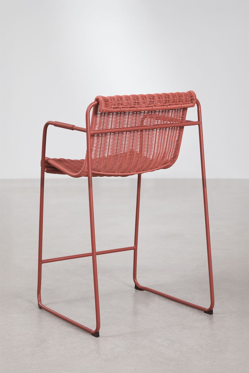 Stackable high stool with armrests in synthetic wicker and steel Revia, gallery image 3