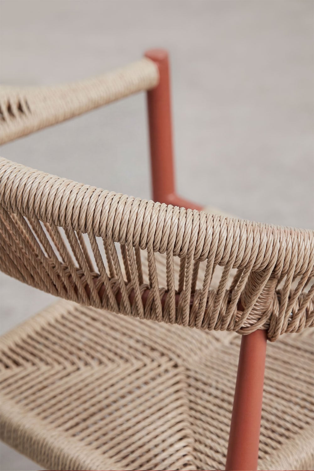 Stackable dining chair with armrests in aluminum and synthetic rattan Amatria, gallery image 4