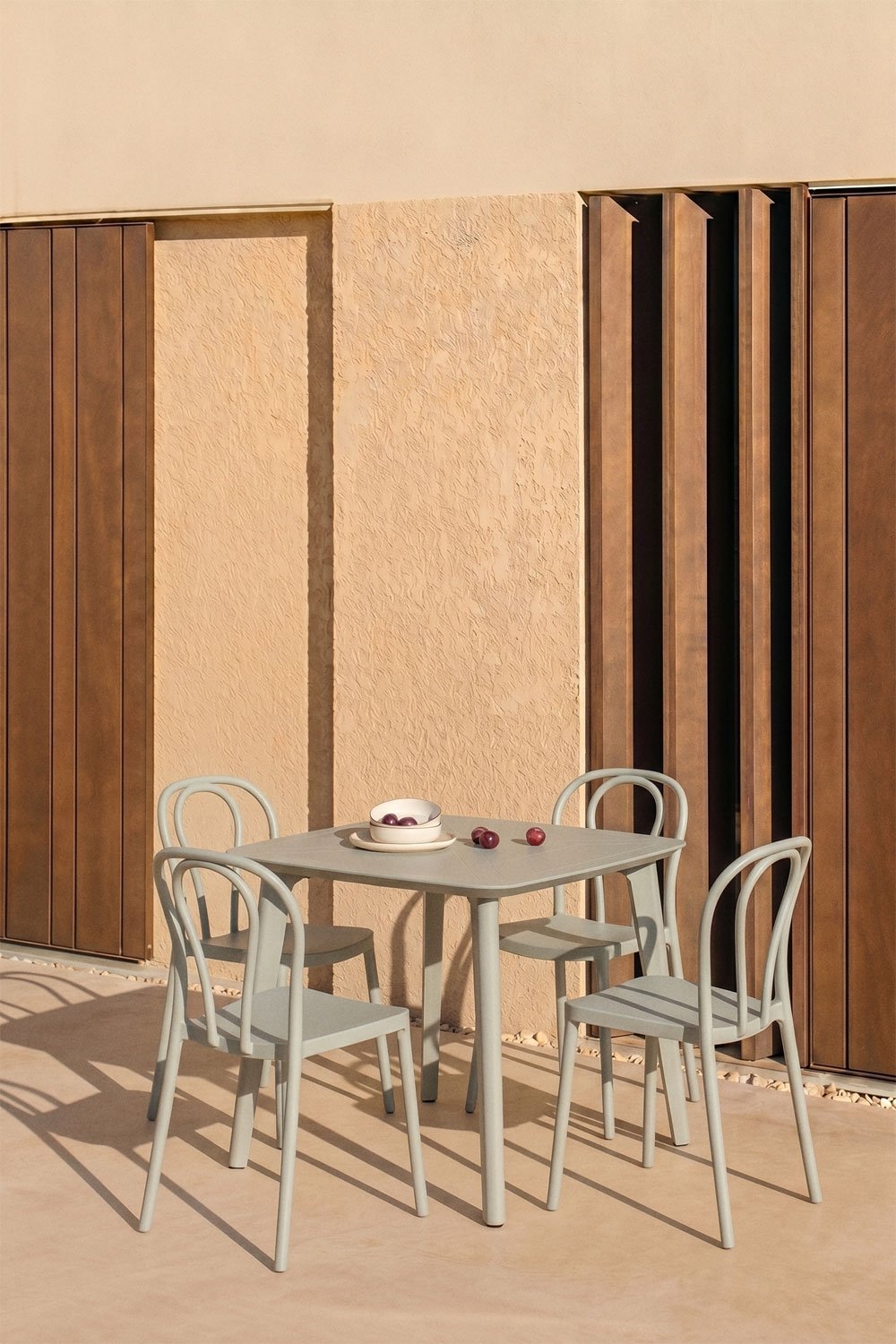 Scand 85x85 cm square table set and 4 stackable Mizzi polypropylene garden chairs, gallery image 1