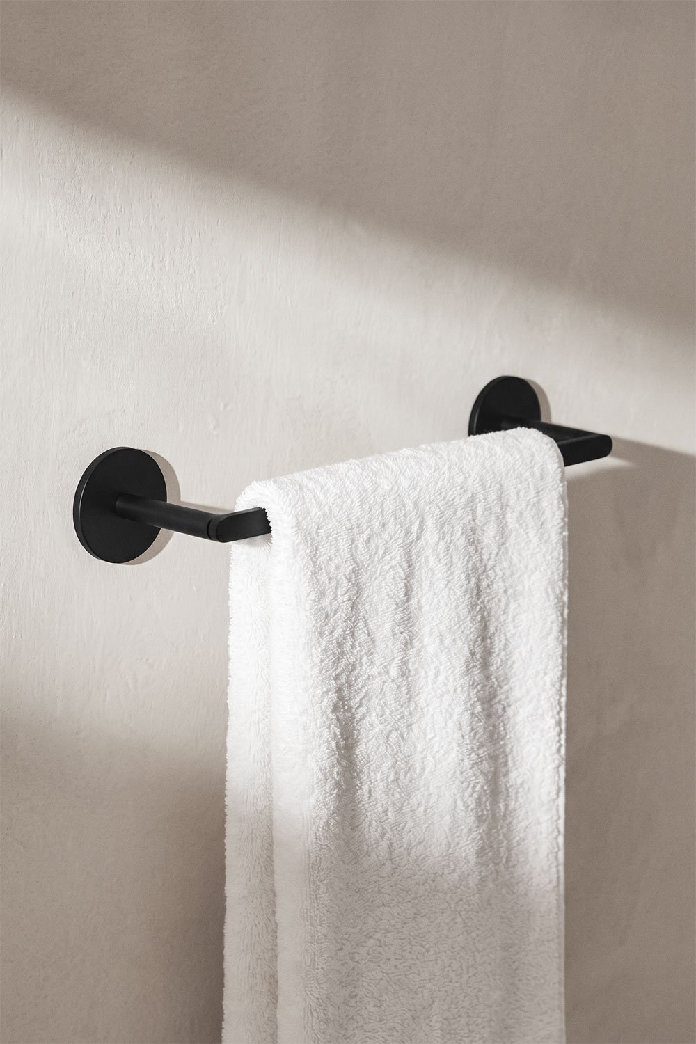 Adhesive wall-mounted towel rail with 30 cm bar for bathroom in matt black stainless steel Caldrumi, gallery image 1